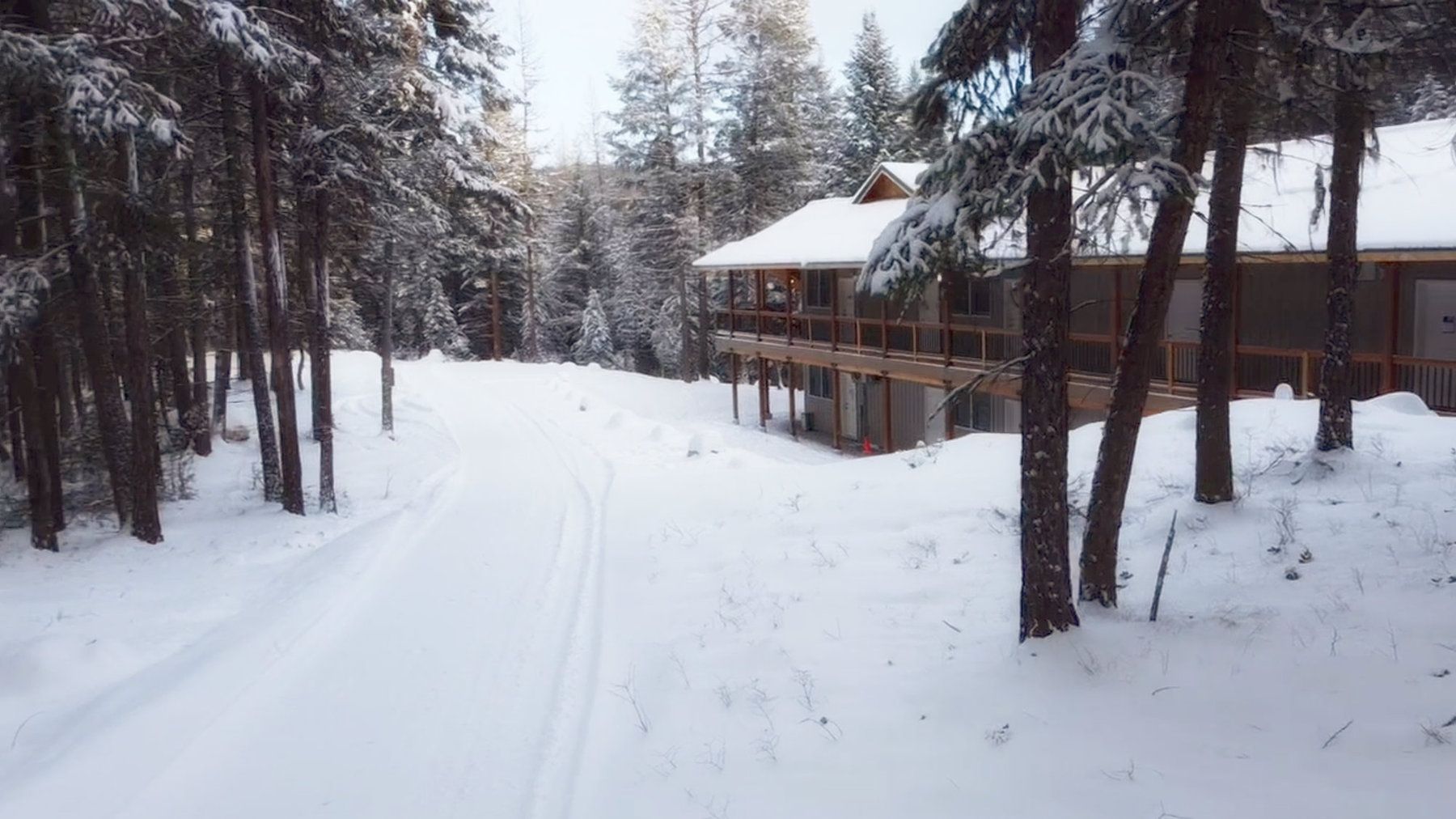 North Star Ranch lodge in the snowy pines near Whitefish, Montana